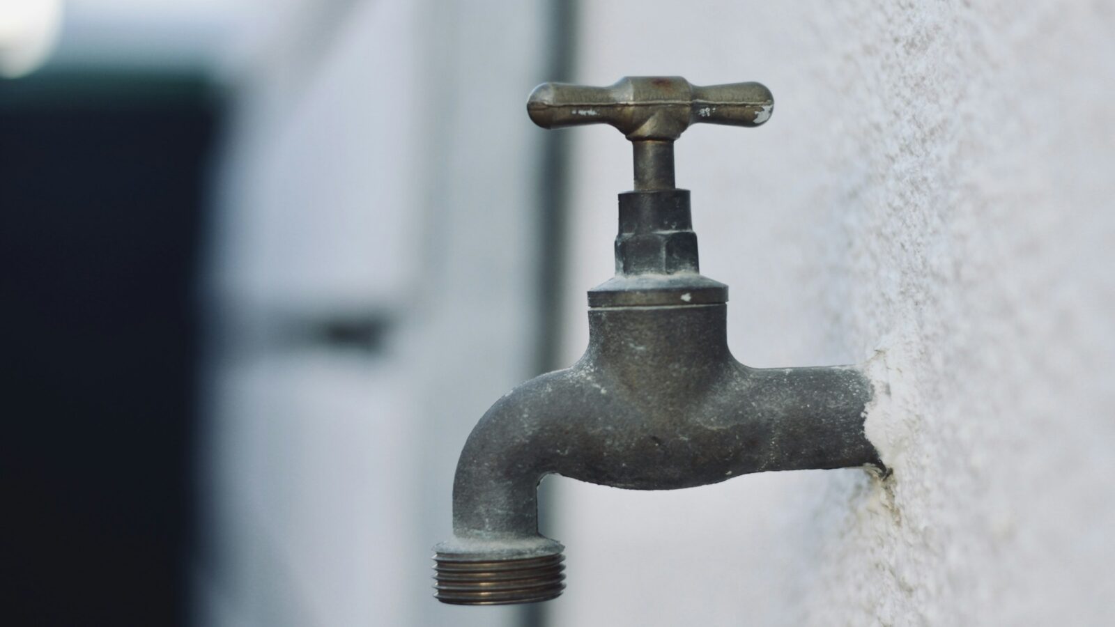Metal outdoor faucet close-up
